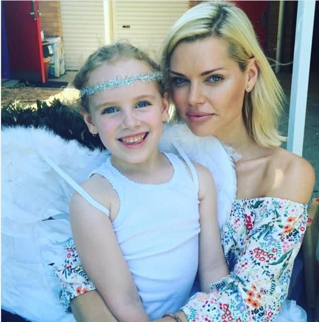 She's already an aunt to her sisters' children, she's pictured here with a niece. Photo: Instagram/Sophie Monk
