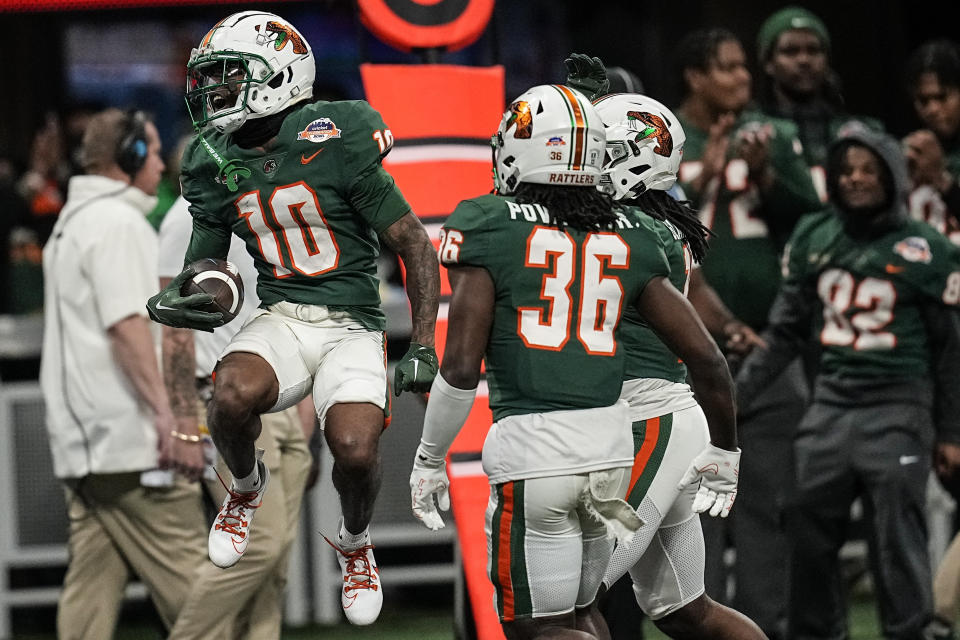 Florida A&M wide receiver Jah'Marae Sheread (10) celebrates his run against Howard during the first half of an NCAA Celebration Bowl football game, Saturday, Dec. 16, 2023, in Atlanta. (AP Photo/Mike Stewart)