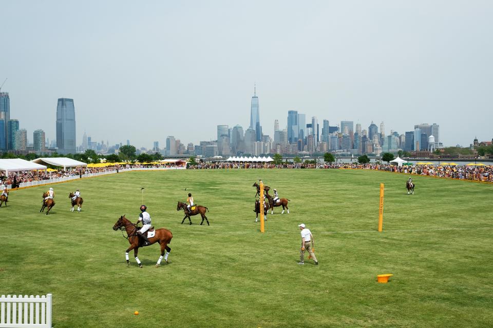 <h1 class="title">A view of the polo match with the Manhattan skyline in the background</h1><cite class="credit">Photo: Getty Images</cite>