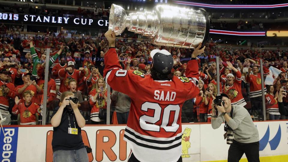 Chicago forward Brandon Saad hoists the Stanley Cup after a final that produced disappointing ratings for Rogers.