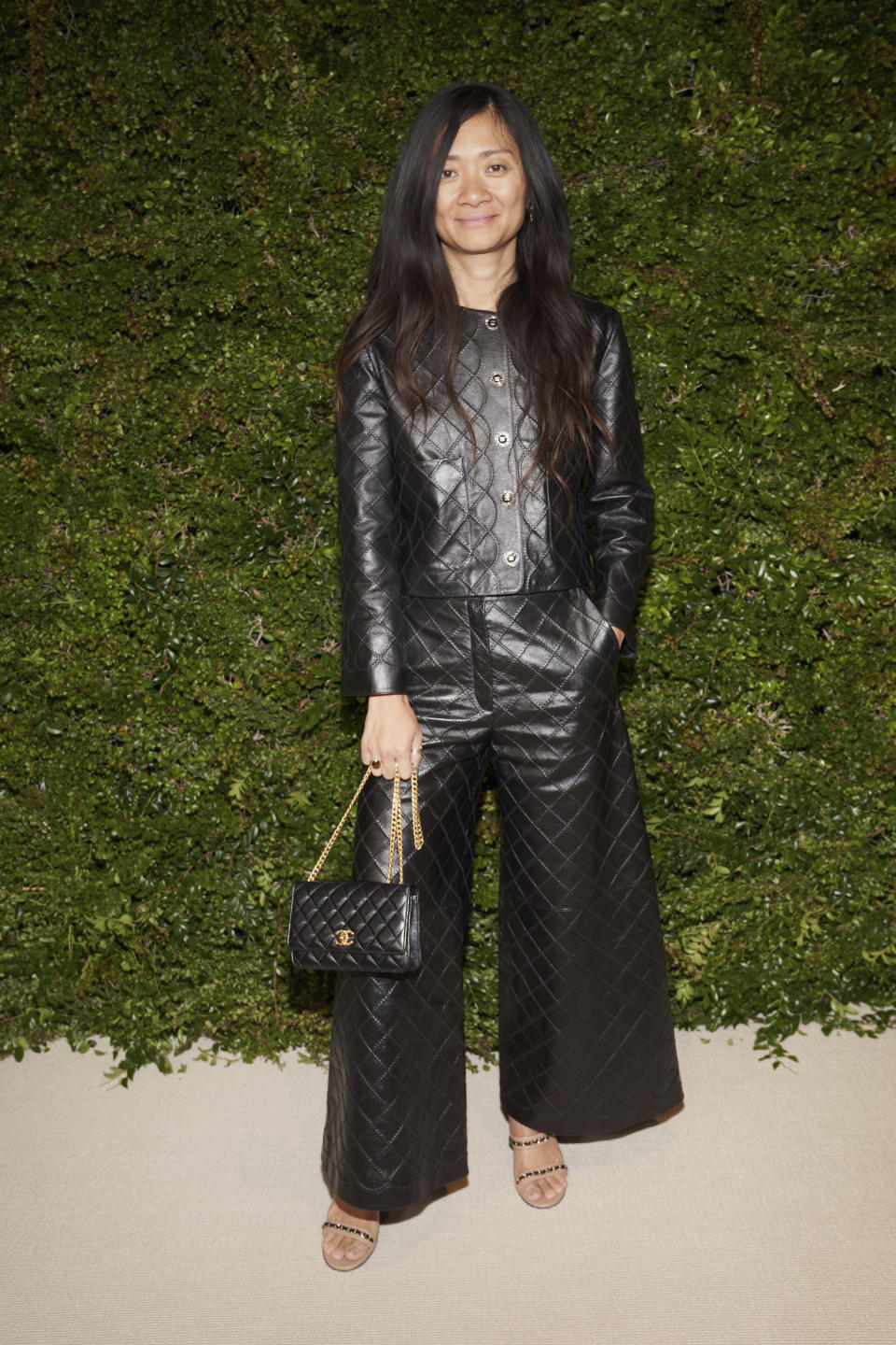 Chloé Zhao arrives at The Academy Women's Luncheon presented by CHANEL on Wednesday, Nov. 16, 2022, at Academy Museum of Motion Pictures in Los Angeles. (AP Photo/Allison Dinner)