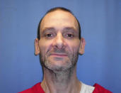 This undated photo provided by the Mississippi Department of Corrections shows David Neal Cox. The Mississippi Supreme Court has set a Nov. 17, 2021, execution date for Cox, who withdrew his appeals. He pleaded guilty in September 2012 to shooting his wife Kim in May 2010 in the town of Sherman, sexually assaulting her daughter in front of her, and watching Kim Cox die as police negotiators and relatives pleaded for her life. (Mississippi Department of Corrections via AP)