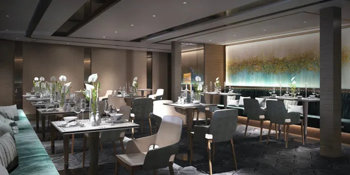 A rendering of the S.E.A restaurant with dining tables, chairs, set tables on the Ritz-Carlton Evrima.