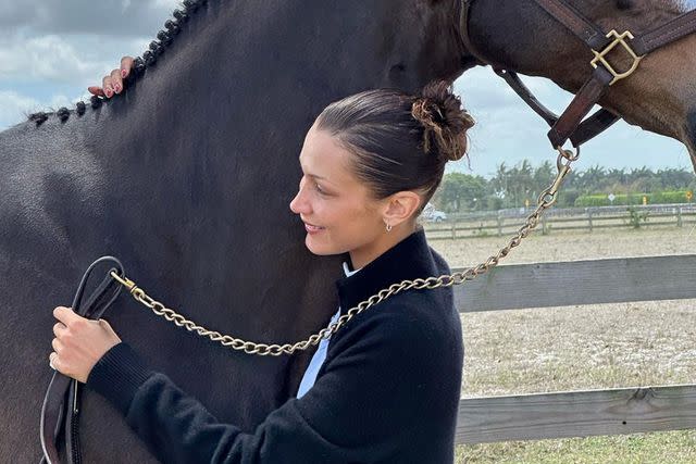 <p>Bella Hadid/Instagram</p> Bella Hadid shares a photo of herself with a horse on Instagram