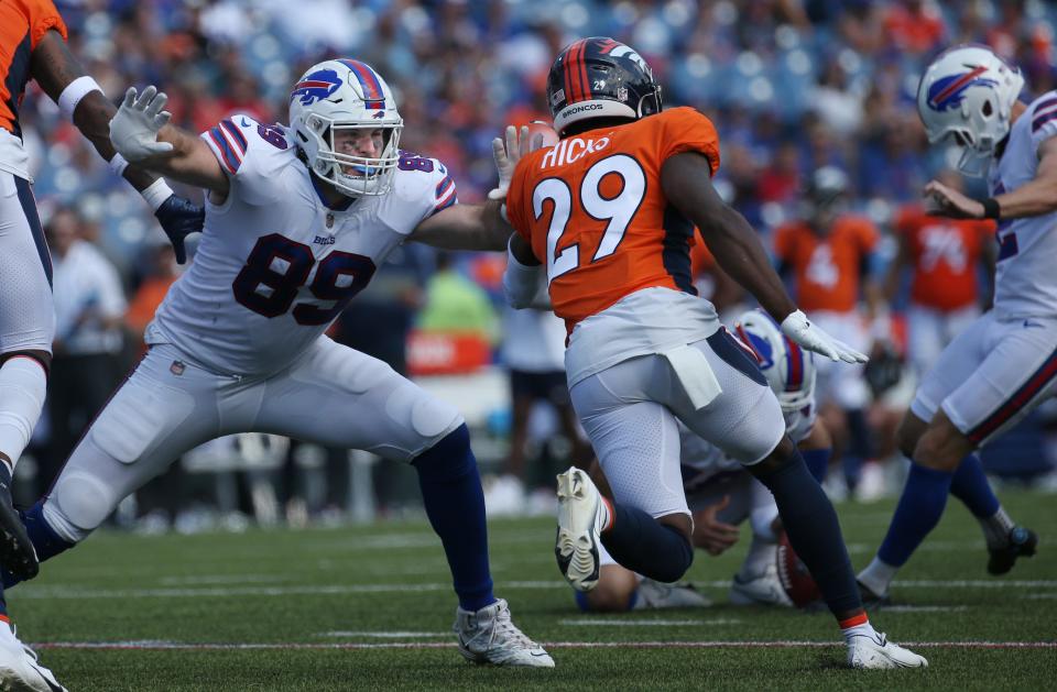 Bills tight end Tommy Sweeney (89) blocks Denver cornerback Faion Hicks (29) on special teams during a field goal attempt during the Bills preseason game against Denver Saturday, Aug. 20, 2022 at Highmark Stadium.