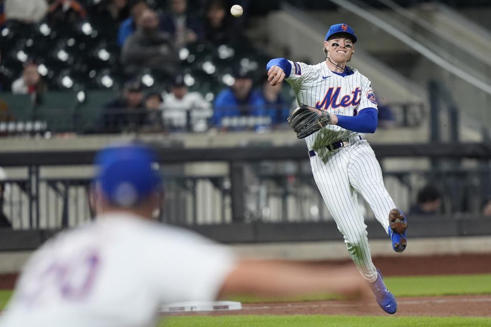 New York Mets' Brett Baty throws out Detroit Tigers' Matt Vierling at first base during the sixth inning of a baseball game Monday, April 1, 2024, in New York. (AP Photo/Frank Franklin II)