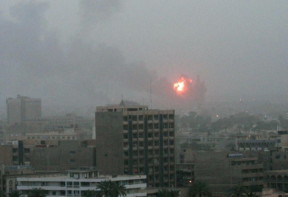 An explosion rocks Baghdad on 20 March 2003 (AFP/Getty)