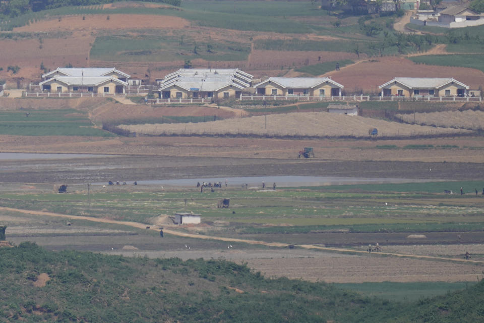 North Korea's Kaepoong town is seen from the unification observatory in Paju, South Korea, Thursday, May 12, 2022. North Korea imposed a nationwide lockdown Thursday to control its first acknowledged COVID-19 outbreak after holding for more than two years to a widely doubted claim of a perfect record keeping out the virus that has spread to nearly every place in the world. (AP Photo/Lee Jin-man)