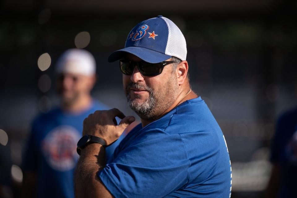 Jesse Burkett 12U manager Gino Porcelli catches the camera looking his way during practice Thursday at Rockwood Field.