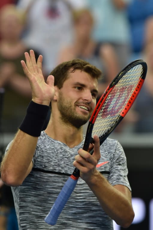 Bulgaria's Grigor Dimitrov celebrates beating Uzbekistan's Denis Istomin in their Australian Open fourth round match, in Melbourne, on January 23, 2017