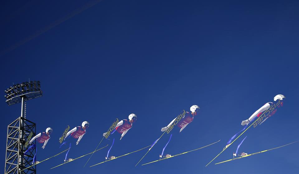 Japan's Daiki Ito soars through the air during the men's ski jumping individual normal hill training event of the Sochi 2014 Winter Olympic Games, at the RusSki Gorki Ski Jumping Center in Rosa Khutor February 7, 2014. Picture taken using multiple exposure function. REUTERS/Kai Pfaffenbach