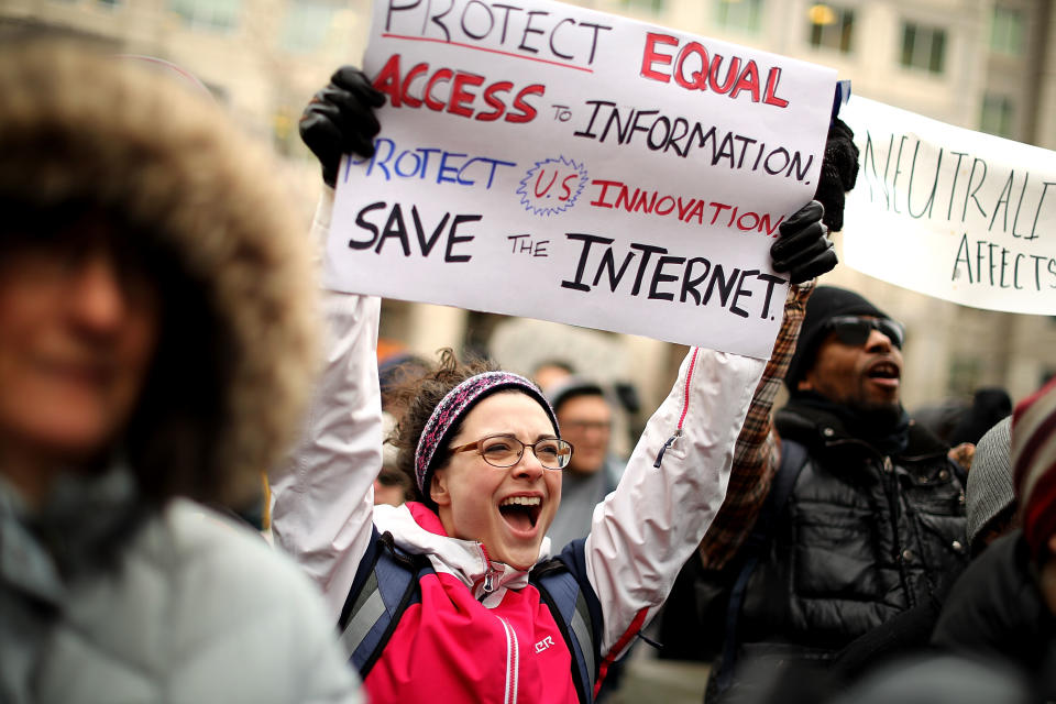 Protesters rally at FCC against repeal of net neutrality rules