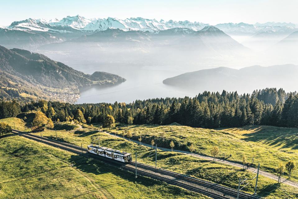 Rigi Railways’ cogwheel trains present dazzling views of Lake Lucerne as they ascend Mount Rigi, known as the “queen of the mountains” in Switzerland.