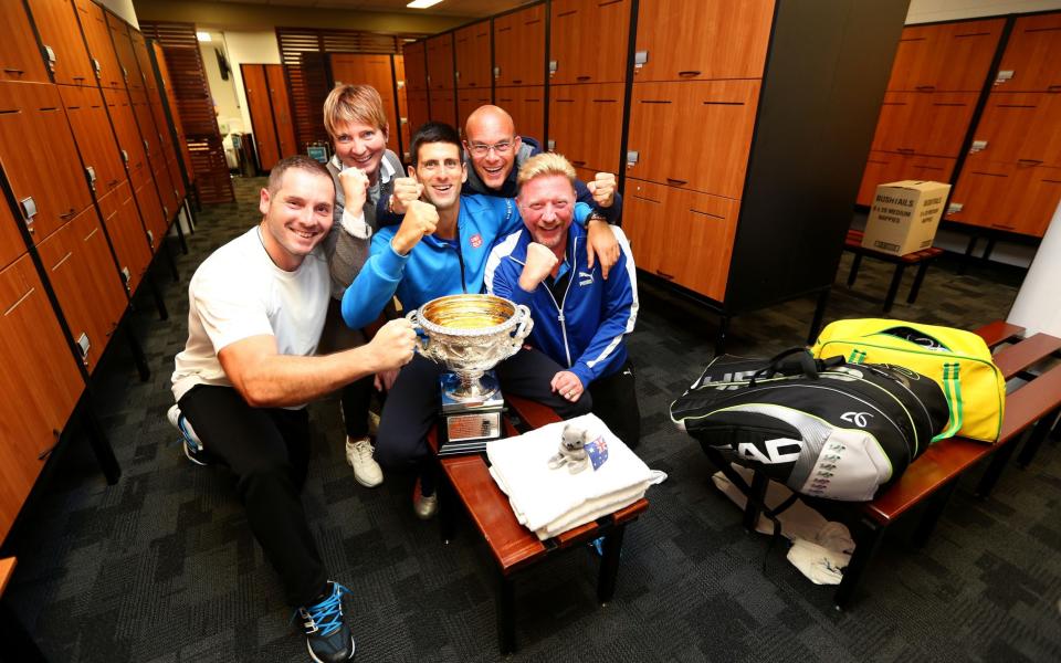 Djokovic and Becker, with agents Edoardo Artaldi and Elena Cappellaro after Djokovic won his men's final match against Andy Murray at the 2015 Australian Open - Clive Brunskill/Getty
