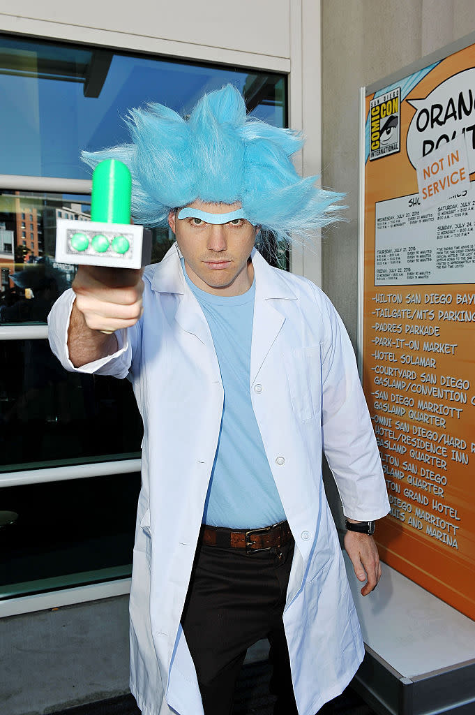 <p>A mad scientist is dressed as the blue-haired Rick from the Adult Swim cartoon <i>Rick and Morty</i>. <i>(Photo: Jerod Harris/WireImage)</i><br></p>