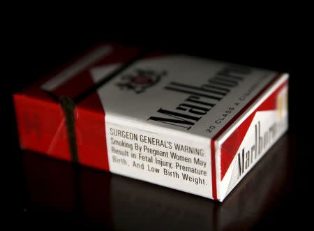 The health warning is seen on a pack of Marlboro tobacco cigarettes in this photo illustration shot in Washington March 17, 2015. REUTERS/Gary Cameron