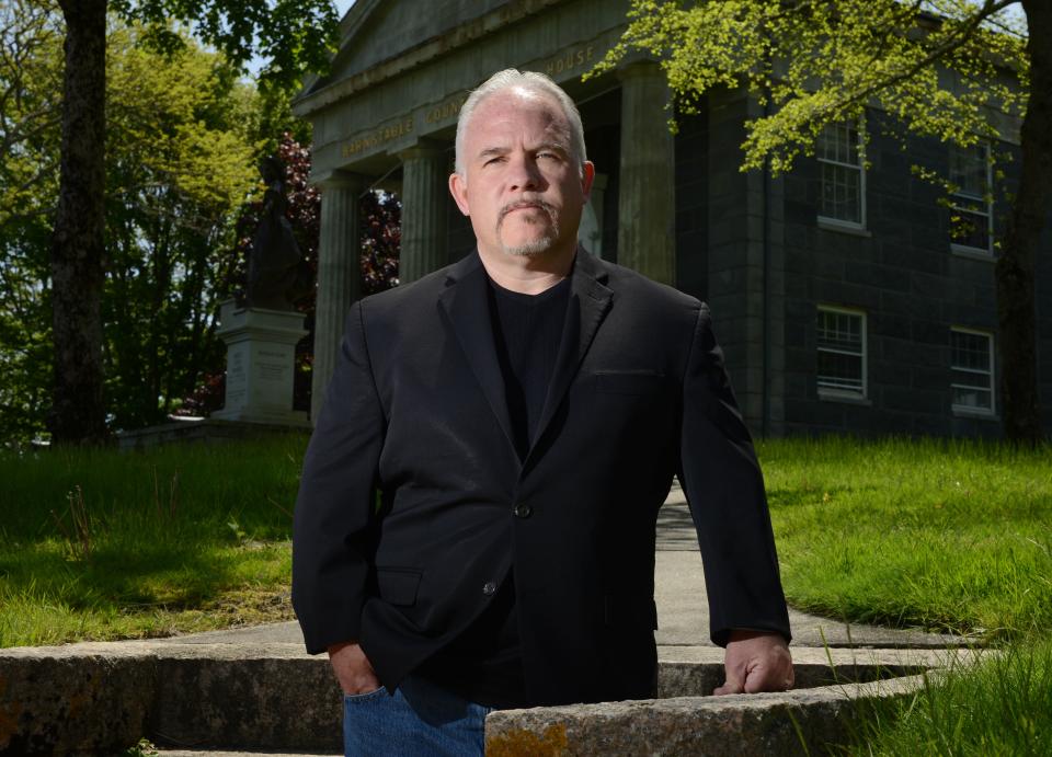 Author Casey Sherman outside of Barnstable Superior Courthouse in 2022. His book "Helltown" is about the Provincetown serial killer Tony Costa, whose trial took place at the courthouse. Amazon Studios is producing a series, based on the book, which may be filmed on Cape Cod.