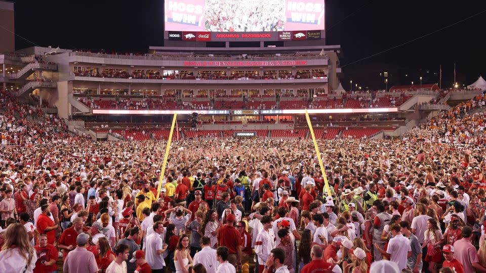 Arkansas Razorbacks fans stormed the field after their win. - Nelson Chenault/USA Today Sports/Reuters