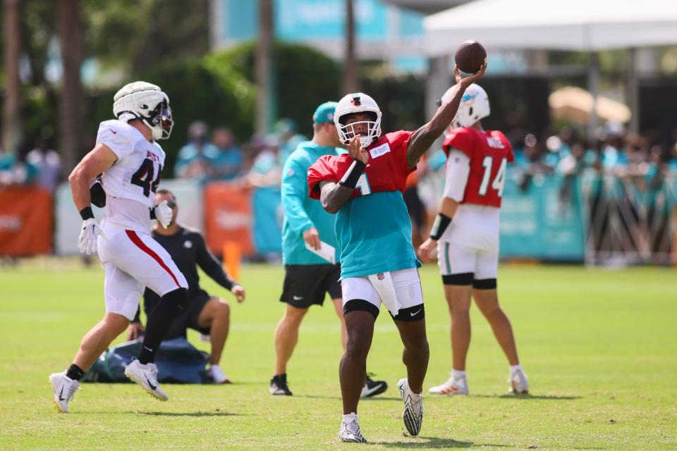 Aug 6, 2024; Miami Gardens, FL, USA; Miami Dolphins quarterback Tua Tagovailoa (1) throws the football during a joint practice with the Atlanta Falcons at Baptist Health Training Complex. Mandatory Credit: Sam Navarro-USA TODAY Sports