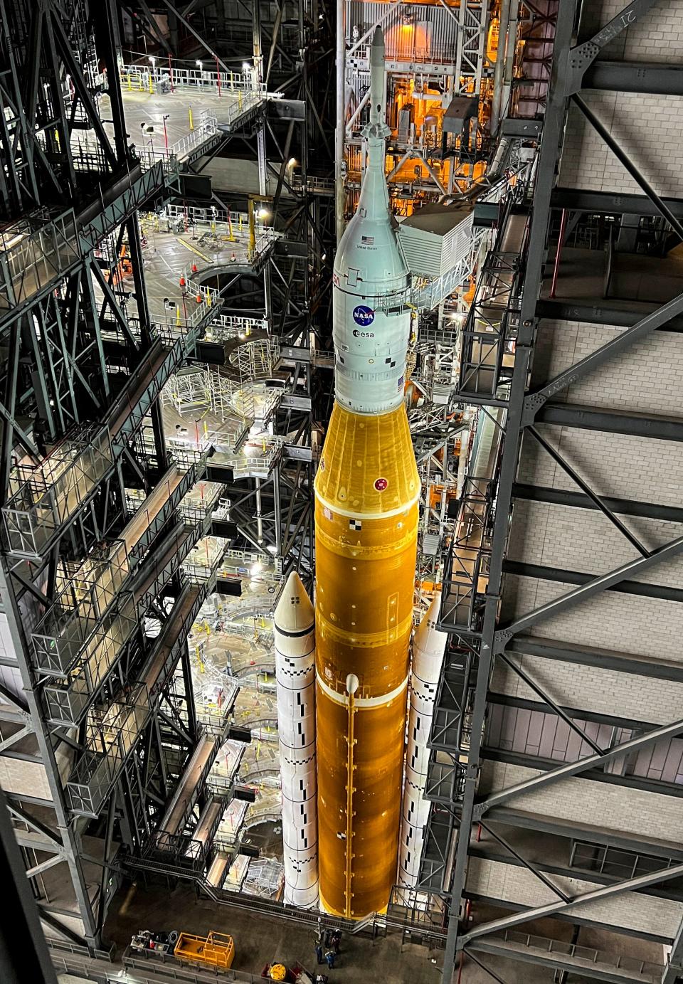 NASA's Artemis I Space Launch System rocket is readied inside the Vehicle Assembly Building at Kennedy Space Center in March 2022. The SLS will launch from Pad 39-B on a mission to the moon. Craig Bailey/FLORIDA TODAY via USA TODAY NETWORK