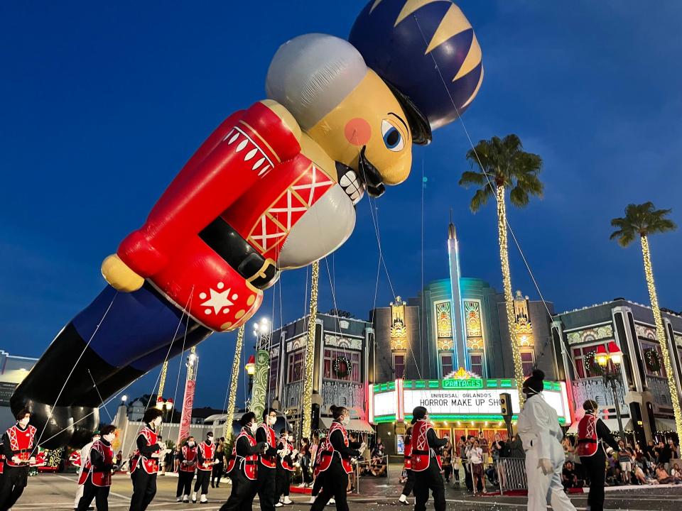 nutcracker balloon at the christmas parade at universal orlando