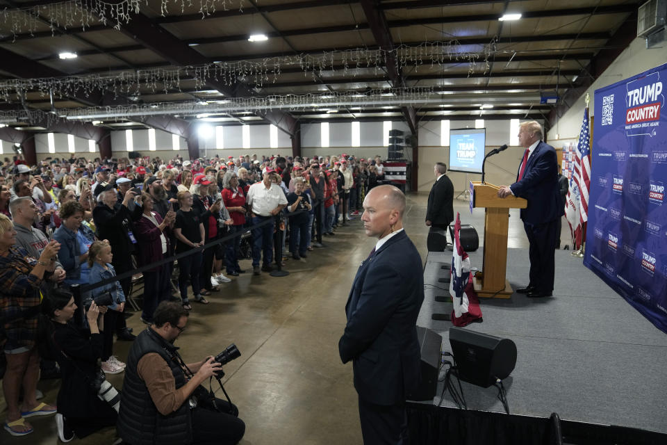 FILE - Former President Donald Trump, right, speaks during a commit to caucus rally, Wednesday, Sept. 20, 2023, in Maquoketa, Iowa. (AP Photo/Charlie Neibergall, File)