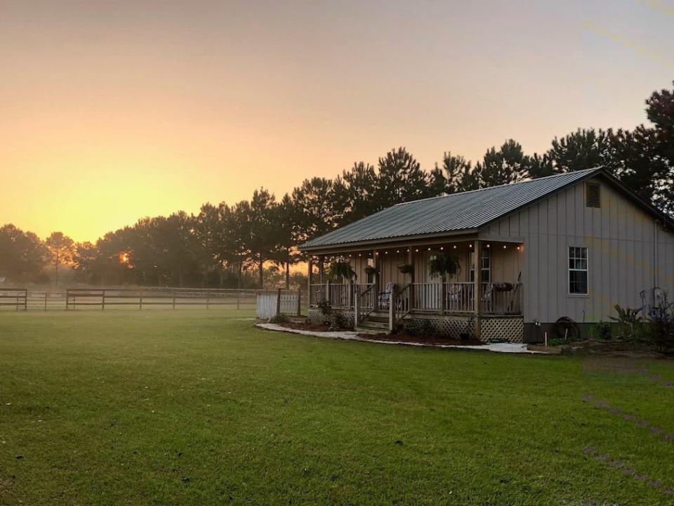 an Airbnb listing called Fairfield Farm Cottage Fairhope DogWelc EV Chargr in Fairhope, Alabama