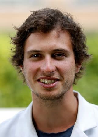 Belgian scientist Sebastiaan Derese, who created a machine that turns urine into drinkable water and fertilizer using solar energy, poses at the University of Ghent, Belgium, July 26, 2016. REUTERS/Francois Lenoir