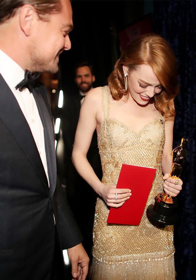 Emma's not lying! Leo gave her the Best Actress envelope and it's in her hand. Photo: Photo: Getty Images