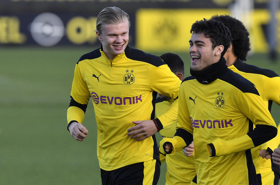 Dortmund's Erling Haaland, left, and Dortmund's Giovanni Reyna exercise during a training session prior the Champions League group F soccer match between Club Brugge and Borussia Dortmund at the training ground in Dortmund, Germany, Tuesday, Nov. 3, 2020. The match will be played in Bruges, Belgium on Wednesday evening. (AP Photo/Martin Meissner)