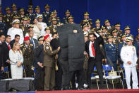 <p>Security personnel surround Venezuela’s President Nicolas Maduro during an incident as he was giving a speech in Caracas, Venezuela, Saturday, Aug. 4, 2018. (Photo: Xinhua via AP) </p>