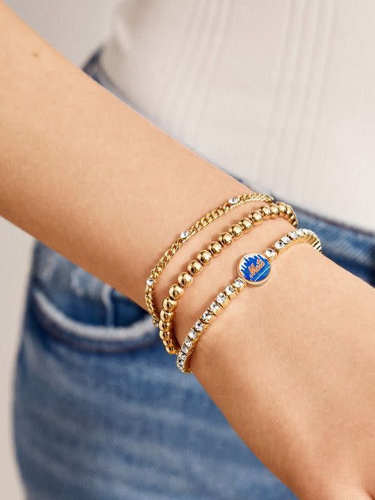 <p><a href="https://go.redirectingat.com?id=74968X1596630&url=https%3A%2F%2Fwww.baublebar.com%2Fproducts%2Fnew-york-mets-tennis-bracelet&sref=https%3A%2F%2Fwww.thepioneerwoman.com%2Ffashion-style%2Fa60384017%2Fbaublebar-mlb-collection%2F" rel="nofollow noopener" target="_blank" data-ylk="slk:Shop Now;elm:context_link;itc:0;sec:content-canvas" class="link ">Shop Now</a></p><p>MLB Gold Tennis Bracelet</p><p>baublebar.com</p><p>$48.00</p>
