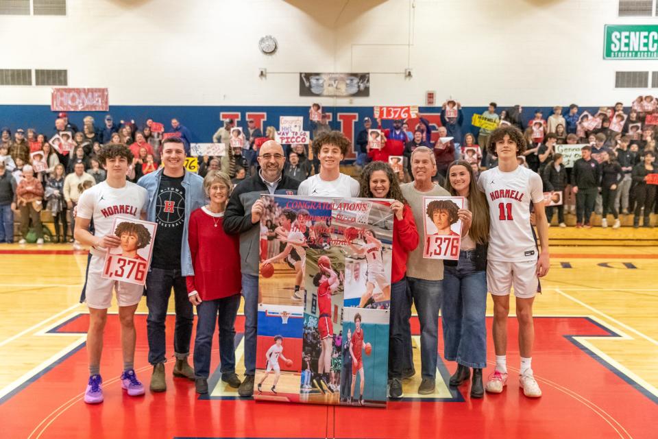 Hornell's win over Pavilion was paused Tuesday night to mark the fall of a long-time Hornell record as Gennaro Picco became the program's all-time leading scorer with 1,376 points in his Red Raider career.