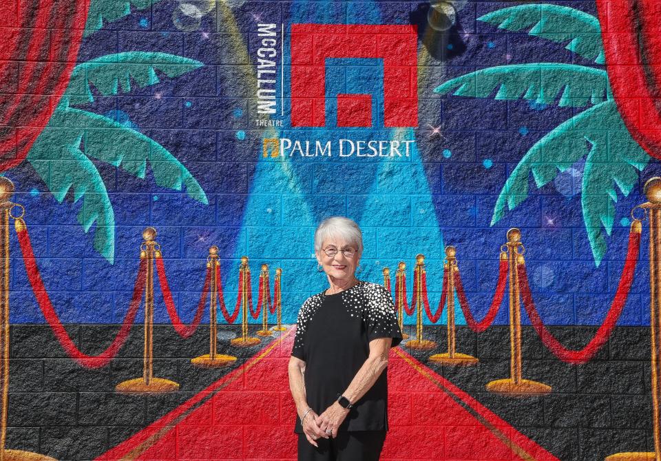 Linda Lechlitner is photographed in front of a mural outside of the McCallum Theatre in Palm Desert, Calif., March 9, 2023. 