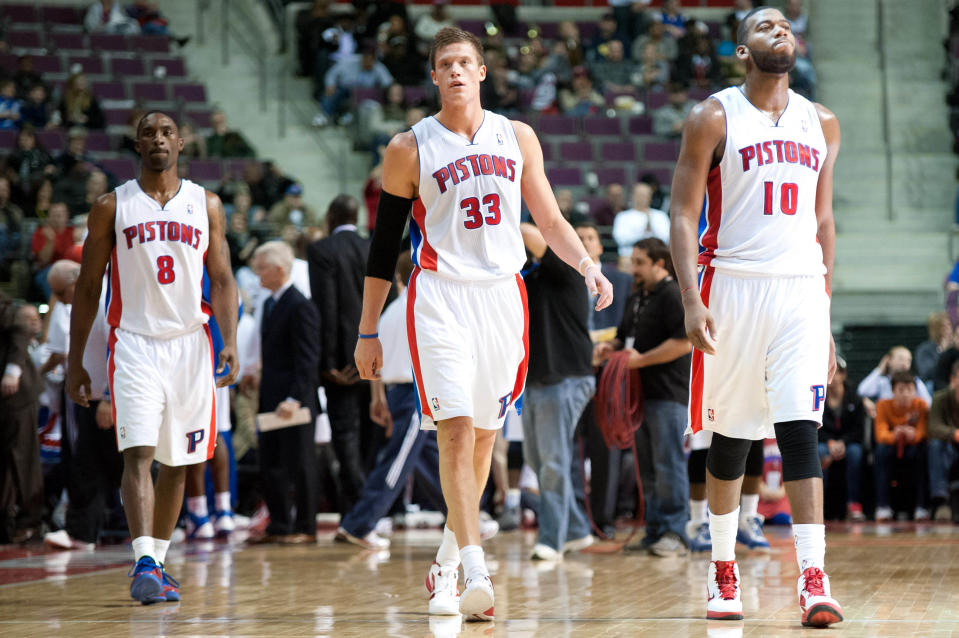 Dec 31, 2011; Auburn Hills, MI, USA; Detroit Pistons power forward Greg Monroe (10), forward Jonas Jerebko (33) and shooting guard Ben Gordon (8) during the second half against the Indiana Pacers at The Palace. Detroit won 96-88.