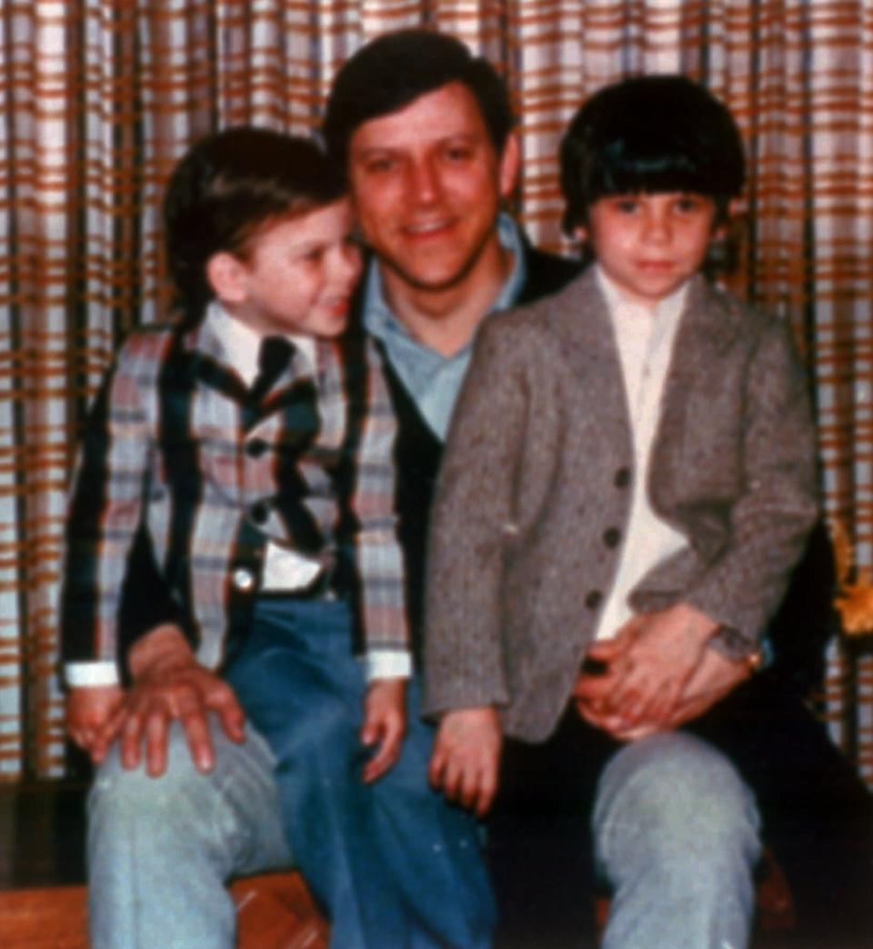 Jose Menendez poses with his sons, Erik, left, and Lyle, who allege their father abused them.