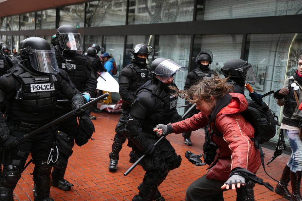 <p>Protesters clash with police Monday, Feb. 20, 2017, in Portland, Ore. Thousands of demonstrators turned out Monday across the U.S. to challenge President Donald Trump in a Presidents Day protest dubbed Not My President’s Day. (Dave Killen/The Oregonian via AP) </p>