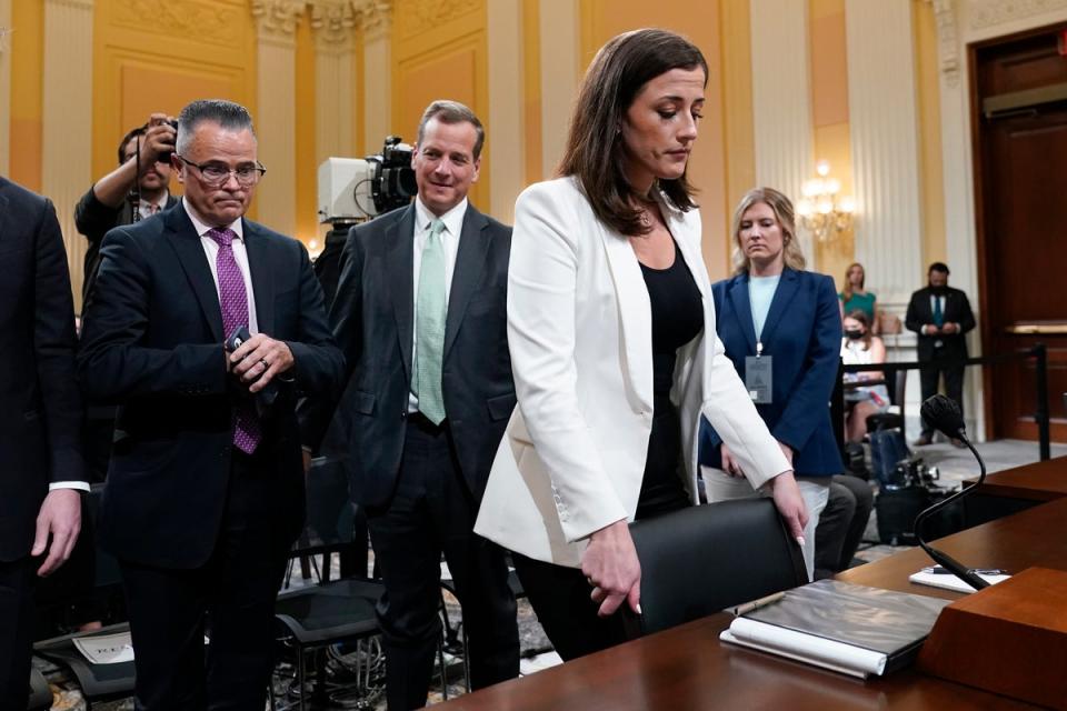 Cassidy Hutchinson, former aide to Trump White House chief of staff Mark Meadows, leaves after testifying (AP)