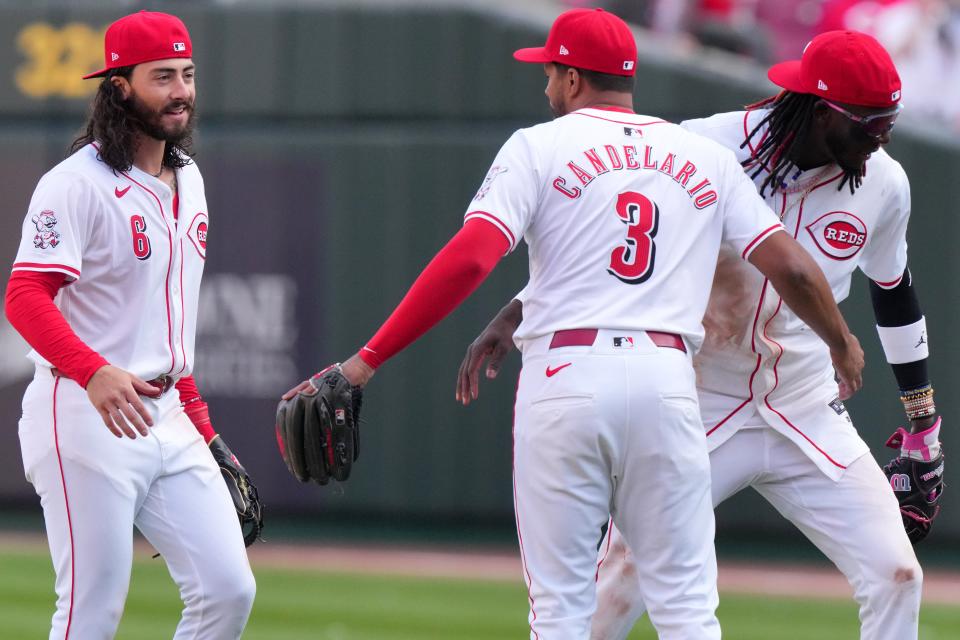 Third baseman Jeimer Candelario is providing a veteran presence and making an impact with the team's young core. His locker is next to young shortstop Elly De La Cruz.