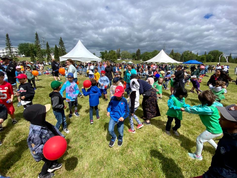 Students participate in celebrations in Victoria Park in Saskatoon for National Indigenous Peoples Day on June 21, 2023.