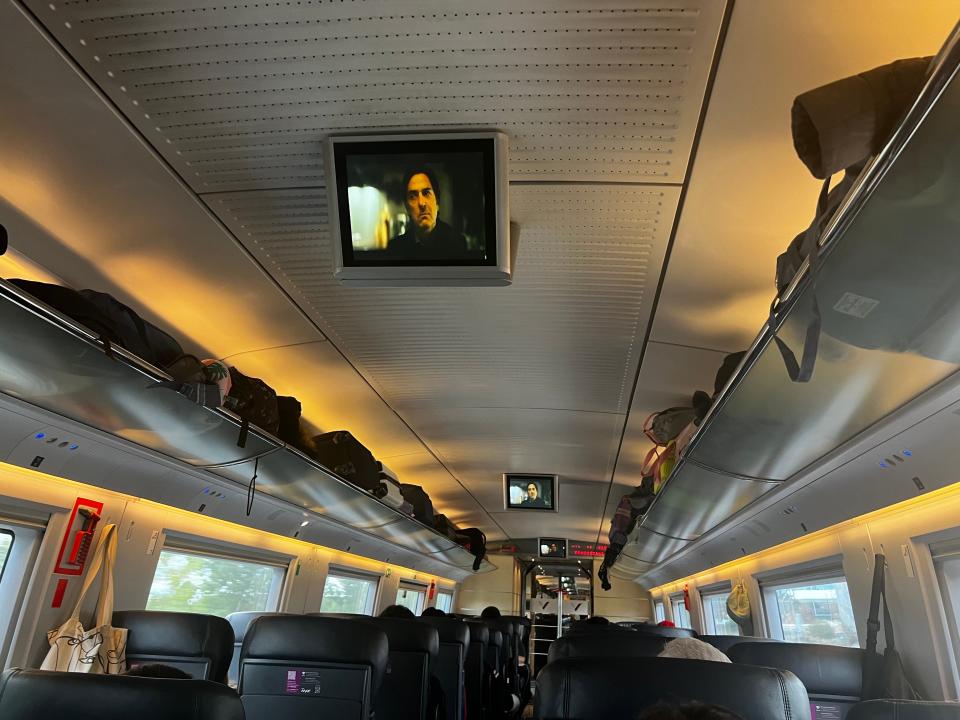 Movie screen on a train.