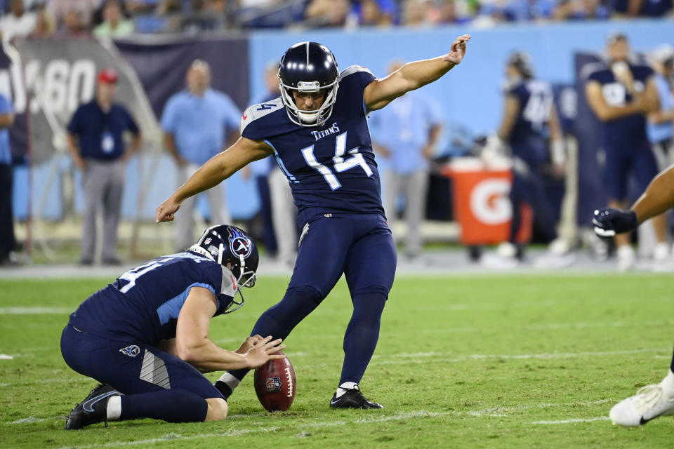 Tennessee Titans kicker Randy Bullock (14) kicks a 51-yard field goal against the Arizona Cardinals in the second half of a preseason NFL football game Saturday, Aug. 27, 2022, in Nashville, Tenn. (AP Photo/Mark Zaleski)