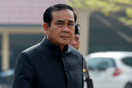 Thailand's Prime Minister Prayuth Chan-ocha is dressed in black as he arrives at a weekly cabinet meeting at Government House in Bangkok, Thailand, October 18, 2016. REUTERS/Chaiwat Subprasom