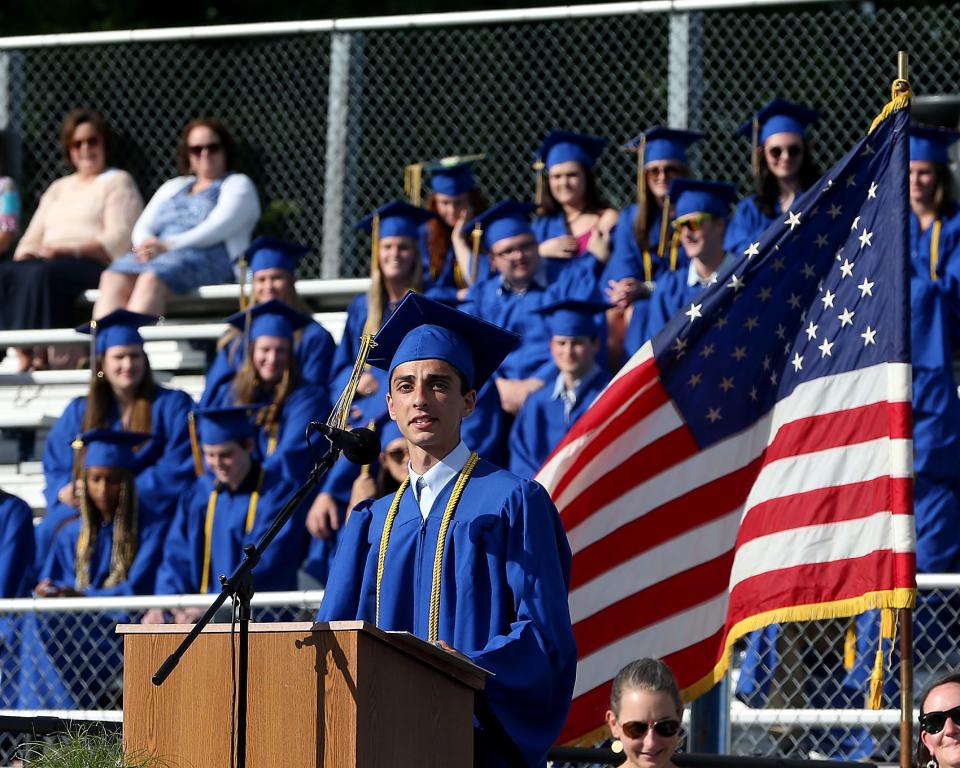 Senior speaker Alex Geagea delivers a humorous address at Norwell High's graduation at the school Saturday.