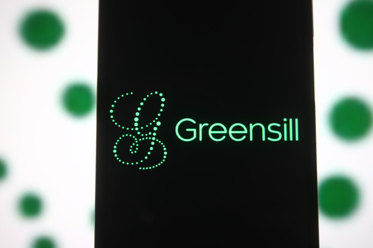 UKRAINE - 2021/04/04: In this photo illustration the Greensill logo of a Greensill Capital financial services company is seen on a smartphone and a pc screen. (Photo Illustration by Pavlo Gonchar/SOPA Images/LightRocket via Getty Images)