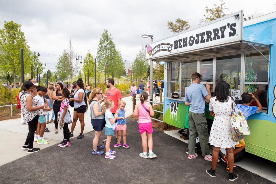 Customers wait to order at a Ben and Jerry’s food truck in the newly renovated Tom Lee Park shortly after it officially opened to the public in Downtown Memphis on Saturday, September 2, 2023.