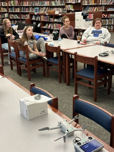 Students learn how to operate a drone during READY FOR HIRE programming.