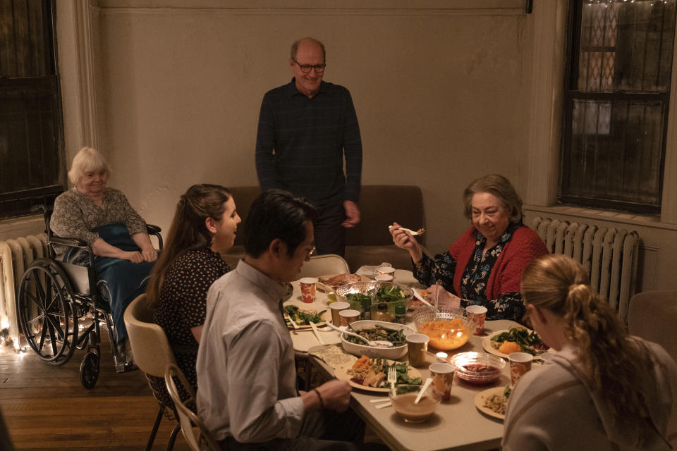 This image released by A24 Films shows, from left, June Squibb, Beanie Feldstein, Steven Yeun, Richard Jenkins, Jayne Houdyshell and Amy Schumer in a scene from "The Humans." (Linda Kallerus/A24 Films via AP)