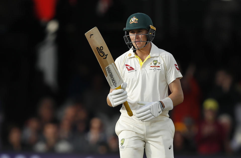 Australia's Marnus Labuschagne acknowledges the crowd after getting 50 runs not out during play on day five of the 2nd Ashes Test cricket match between England and Australia at Lord's cricket ground in London, Sunday, Aug. 18, 2019. (AP Photo/Alastair Grant)