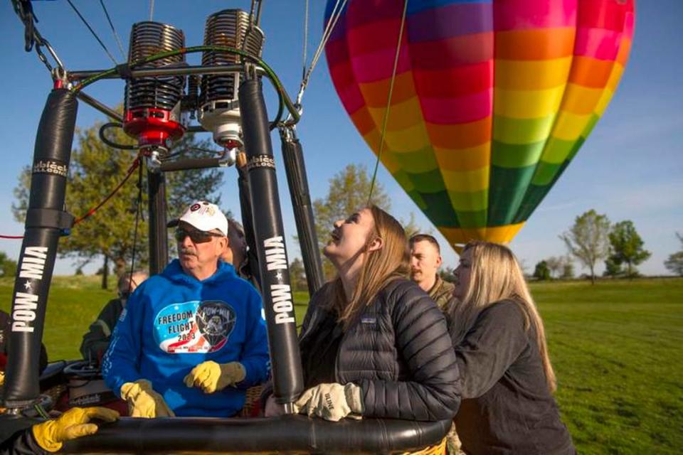 Hannah McIntyre enjoys an awe-inspiring glimpse inside the hot-air balloon. Greg Lehman